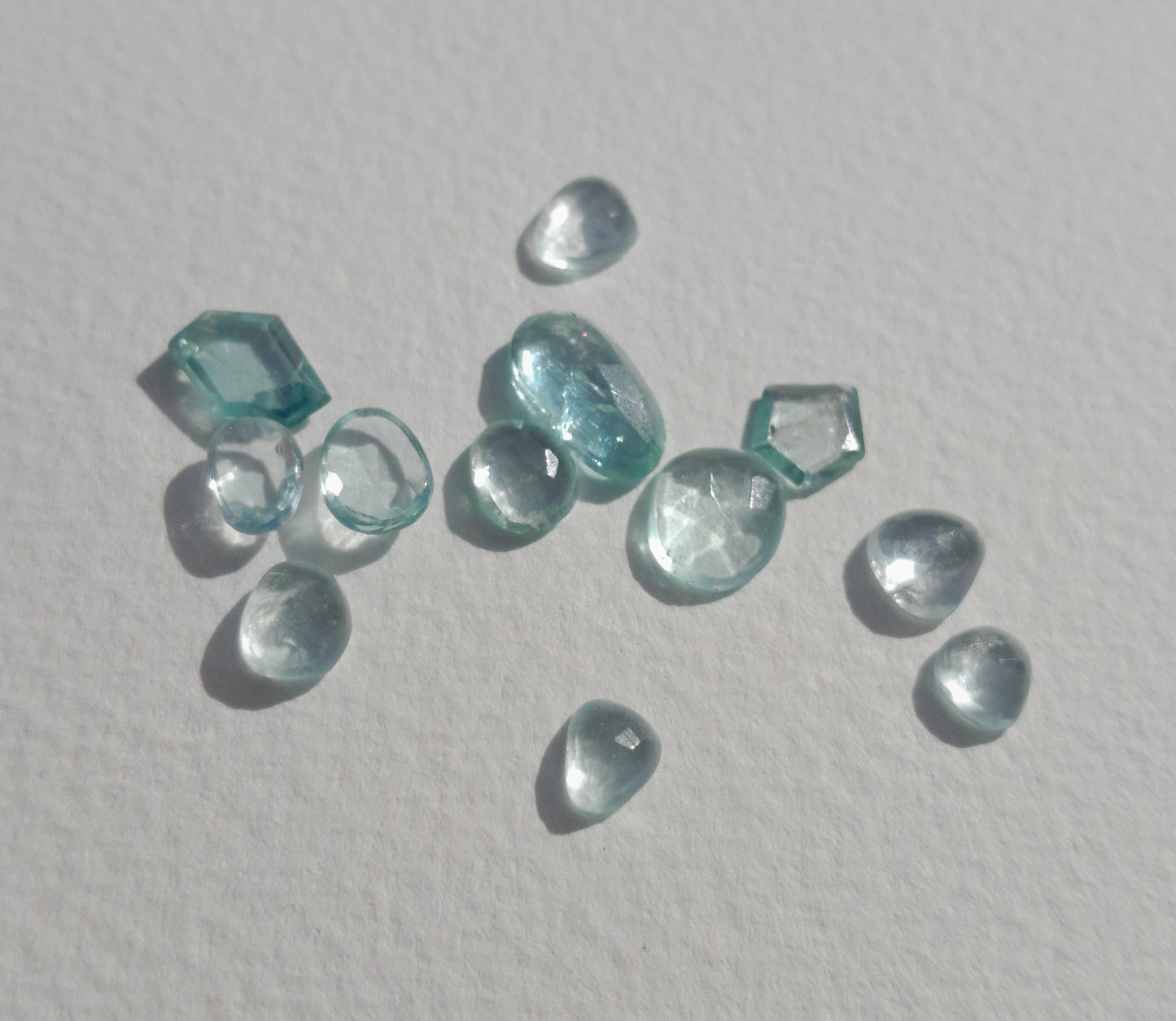Aquamarine and blue zircon cabochon lot