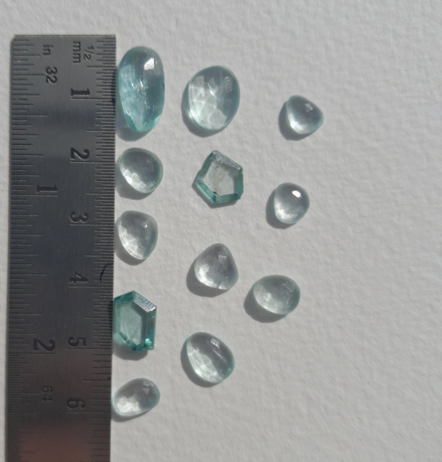 Aquamarine and blue zircon cabochon lot